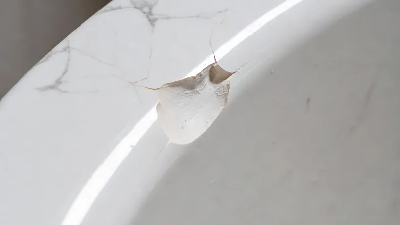 Before photo of cultured marble damage