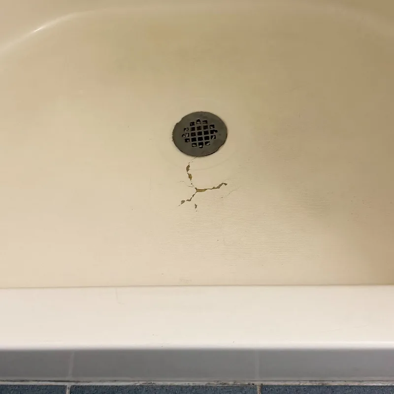 Before photo of fiberglass tub or shower damage